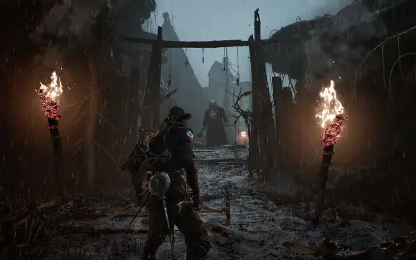 Mortal Shell II video game HD PC desktop wallpaper: armored player walks a rain-soaked ruined village path lit by flaming torches toward a looming enemy.