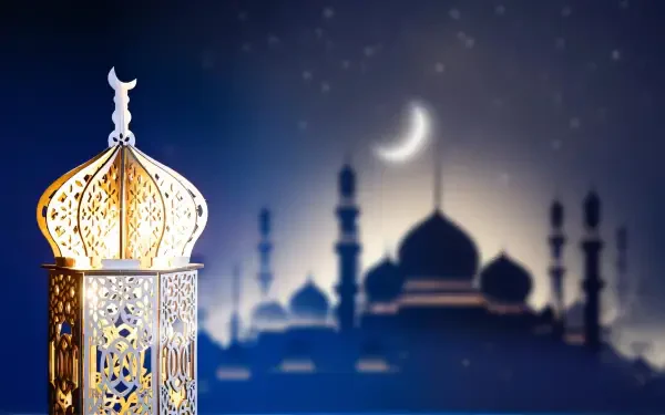 Religious Ramadan HD PC desktop wallpaper: ornate lantern and crescent moon with mosque silhouette against a blue night background.