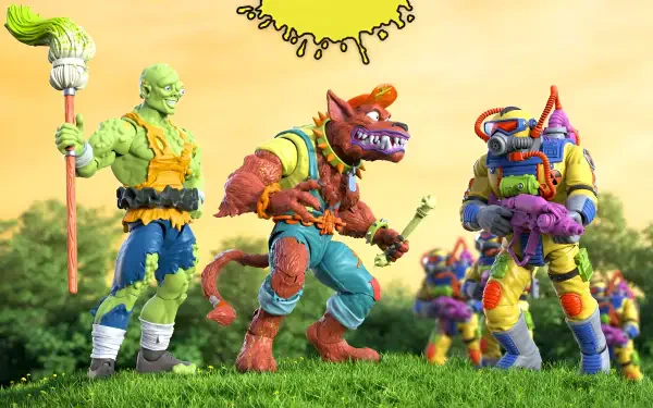 HD PC desktop wallpaper/background of Toxic Crusaders action figures — three colorful mutant heroes posed on grass beneath a stylized sun.