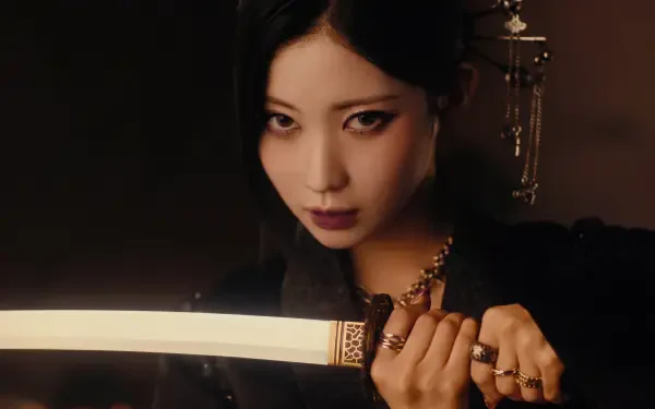 Moody 5K Ultra HD desktop wallpaper of a k-pop idol/Japanese model gripping a katana-like sword, intense stare, ornate hairpiece and dark cinematic lighting.