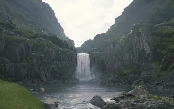 4K Ultra HD PC desktop wallpaper and background, video game scene of a misty waterfall cascading between mossy basalt cliffs into a rocky pool under an overcast sky.