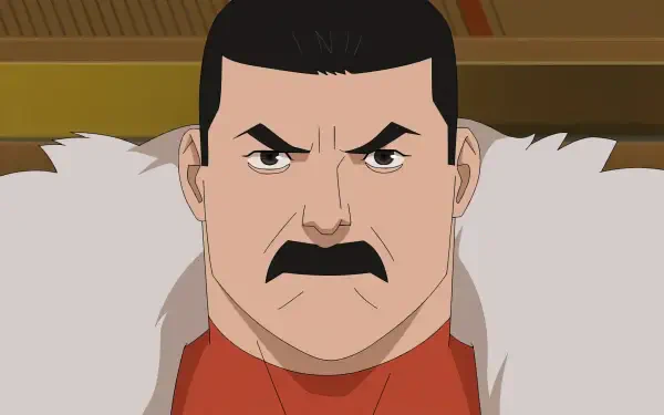 Thragg from TV show Invincible (Image Comics): close-up of a stern, mustached warlord in a red uniform with fur-lined cape. 2K Quad HD PC desktop wallpaper/background.