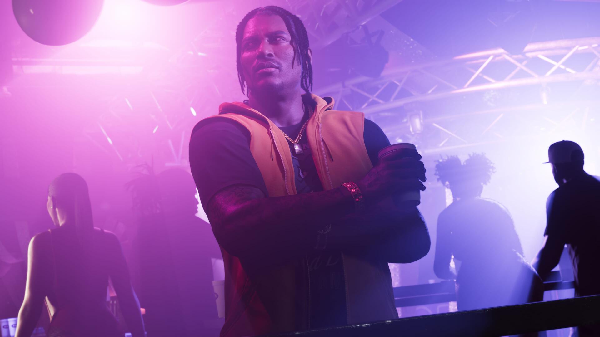 4K Ultra HD GTA VI desktop wallpaper showing DreQuan Priest in neon club lighting, arms crossed among silhouetted crowd — Grand Theft Auto video game background.