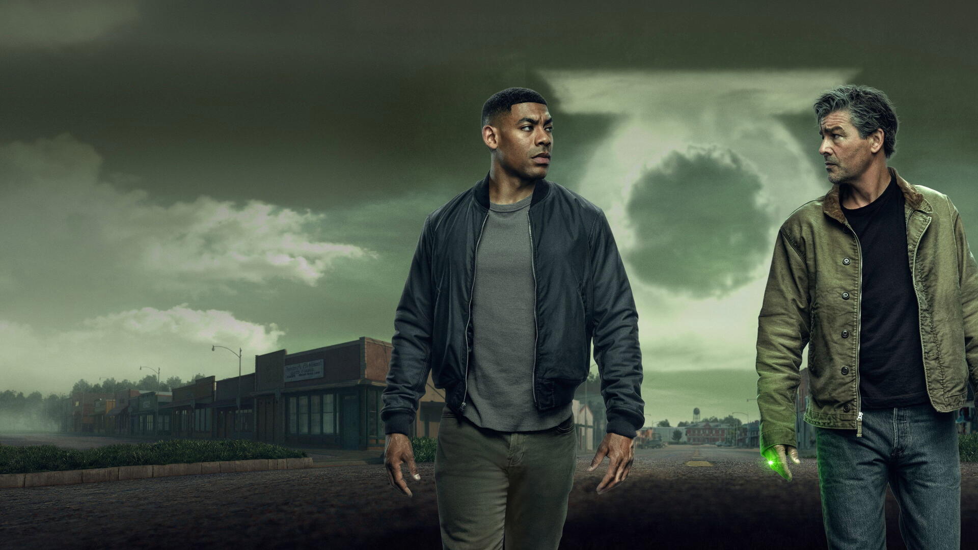 Lanterns (2026) 4K Ultra HD PC desktop wallpaper — two men walk a foggy, deserted street at dusk; one holds a faint green lantern beneath a brooding sky.