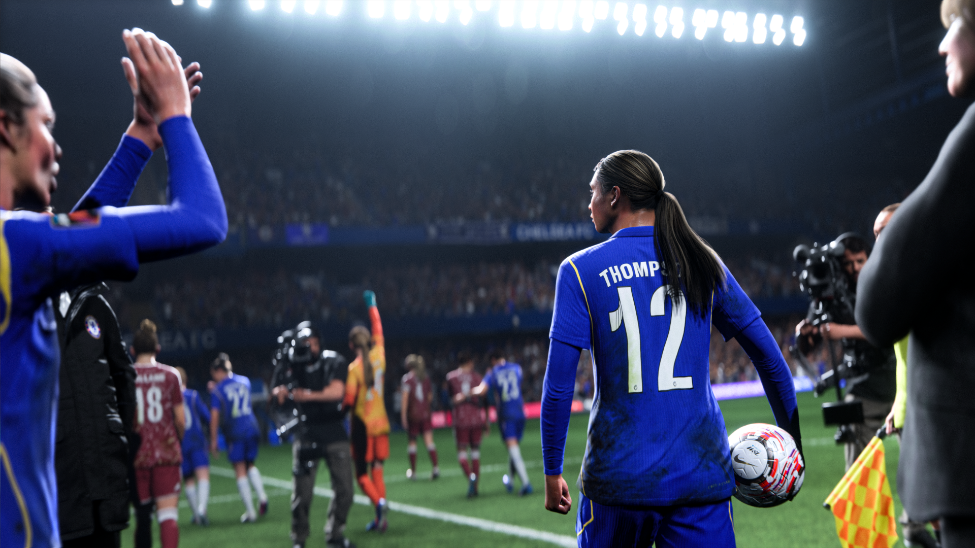 4K Ultra HD PC desktop wallpaper of the EA SPORTS FC 27 video game soccer athlete (#12) walking onto a floodlit stadium pitch with teammates and cameras.