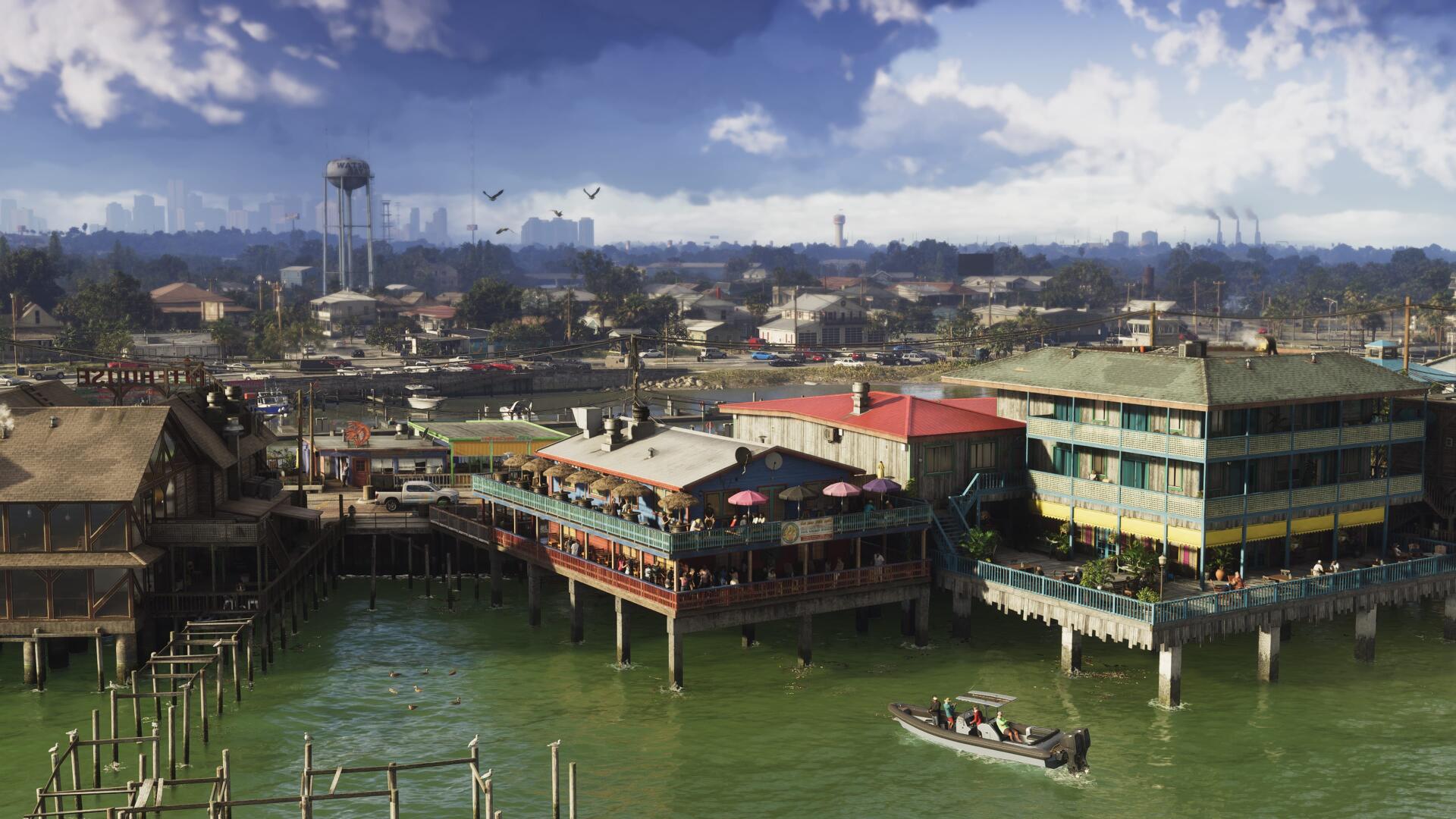 Grand Theft Auto VI 4K Ultra HD PC wallpaper: sunlit waterfront pier with dockside buildings and small boats on green water beneath a partly cloudy sky.