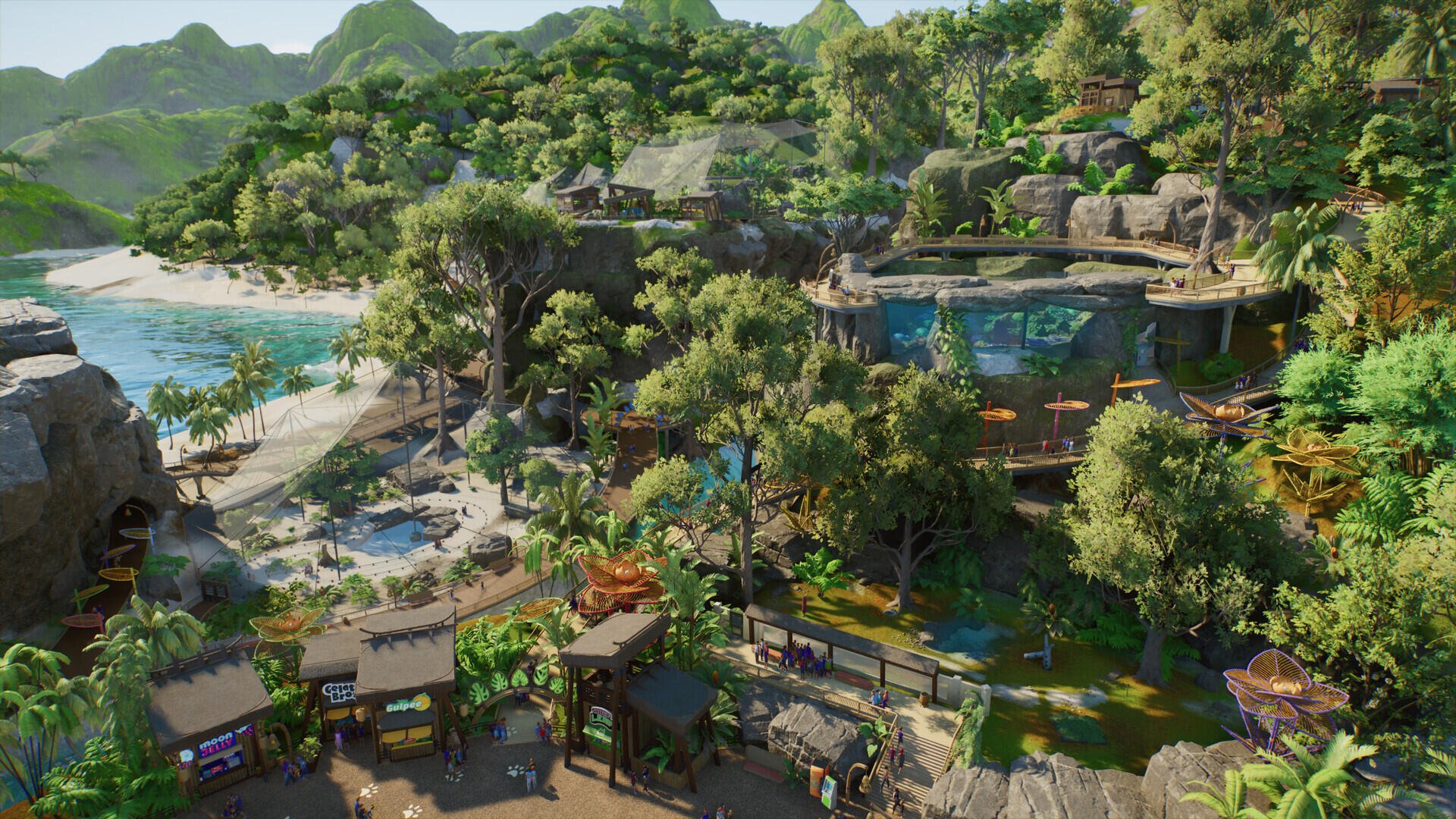 Planet Zoo 2 resort scene: lush jungle surrounding a sparkling lagoon with beach, pools, and tropical resort buildings — HD PC desktop wallpaper and background.