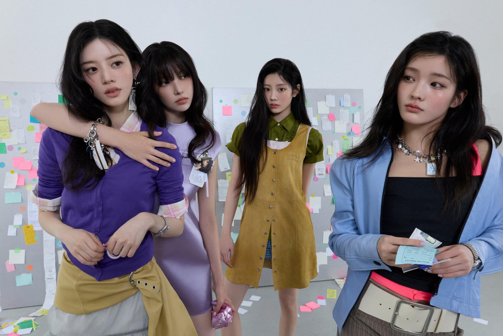 ILLIT girl band members in stylish fashion outfits beside a wall of colorful notes, Break Even 4K Ultra HD PC desktop wallpaper background.