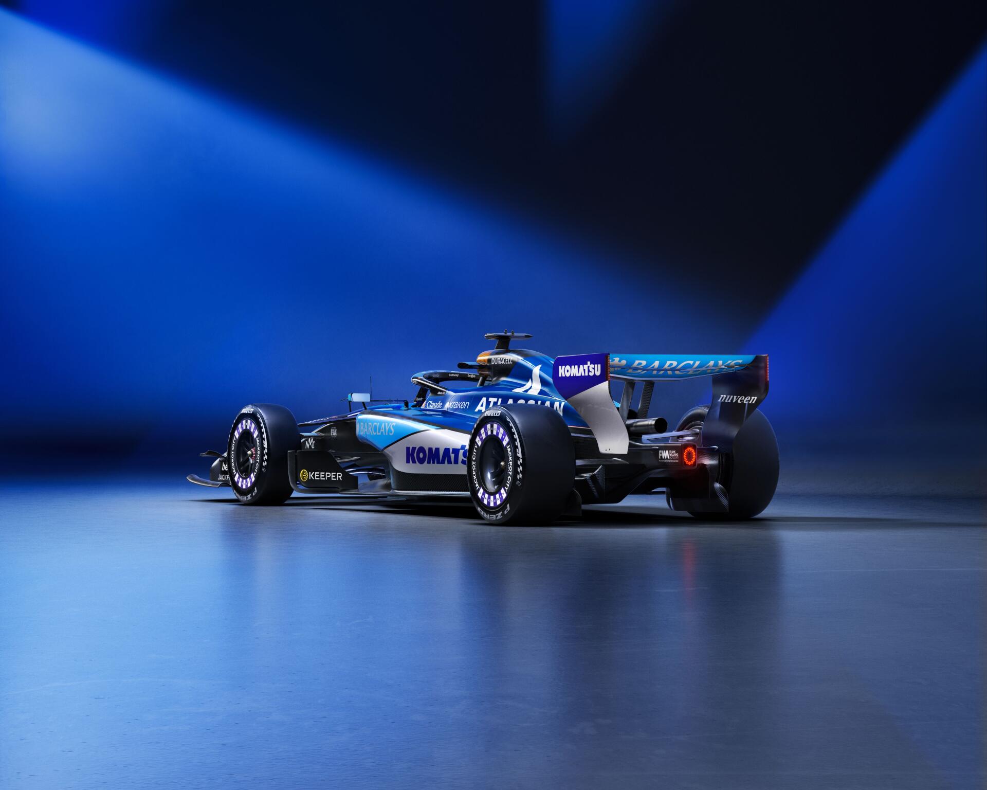 Williams FW48 F1 race car in a blue-lit studio, featured in a 5K Ultra HD PC desktop wallpaper background.