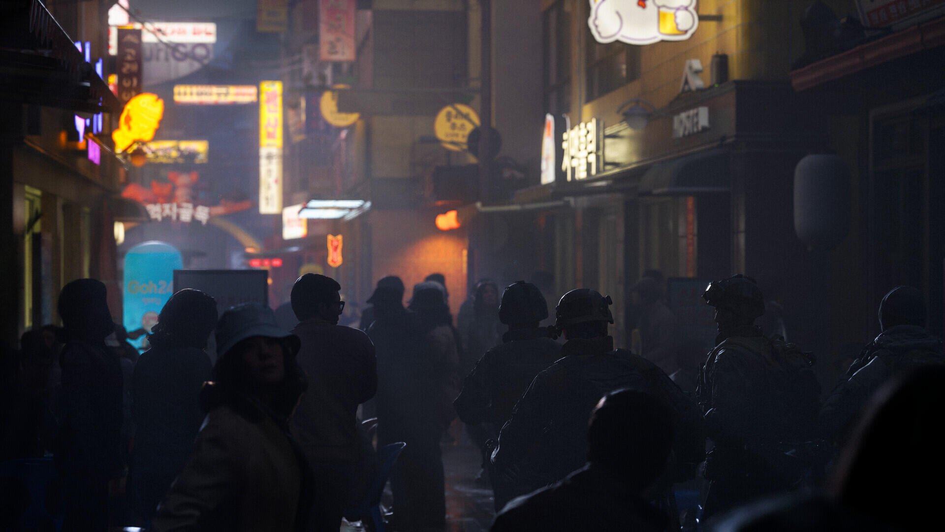 Call of Duty: Modern Warfare 4 HD PC wallpaper showing a crowd moving through a neon-lit city street at night.