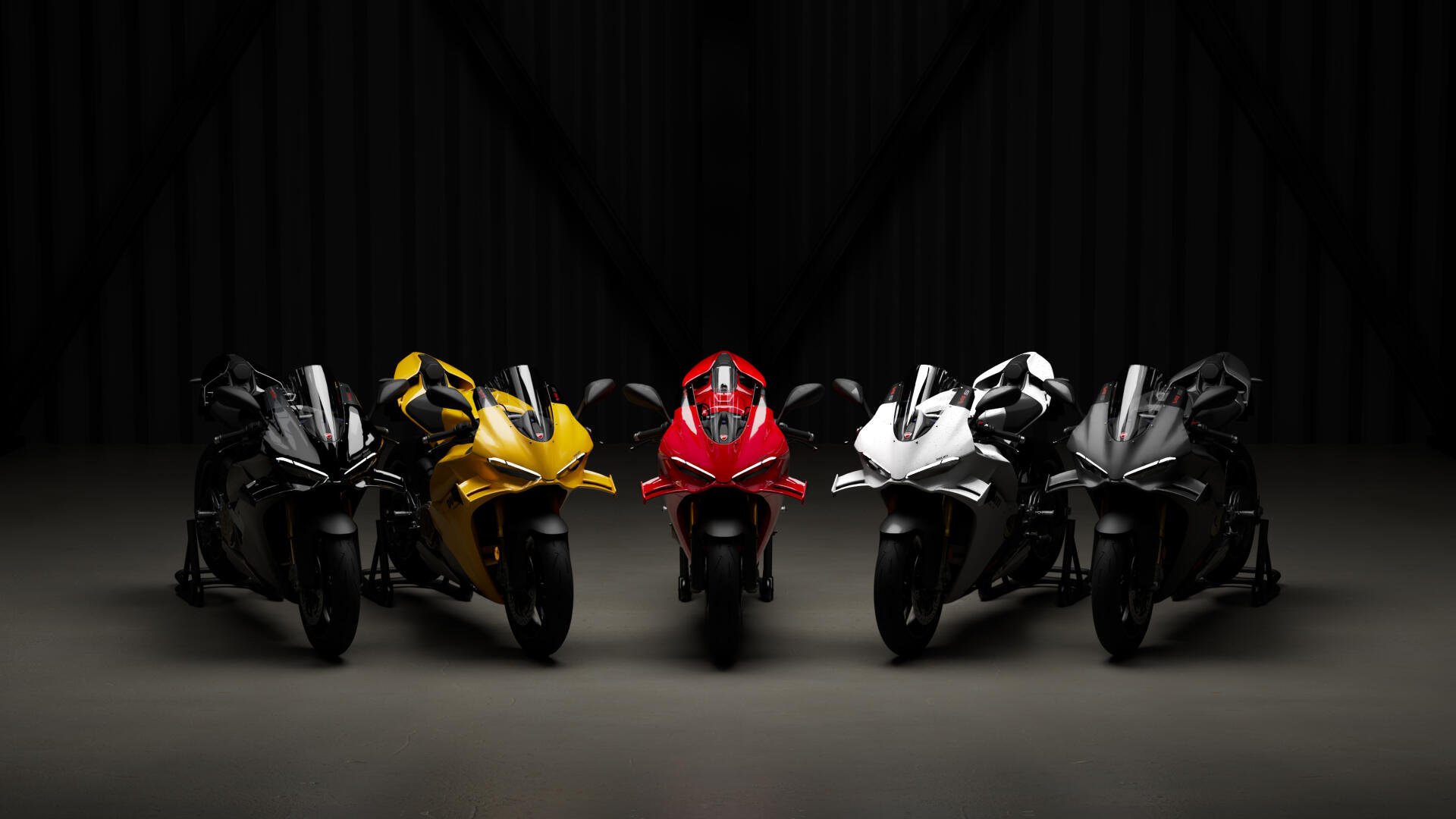 Ducati Panigale V4 sport motorcycles lined up in a dark studio, 4K Ultra HD desktop wallpaper and background.
