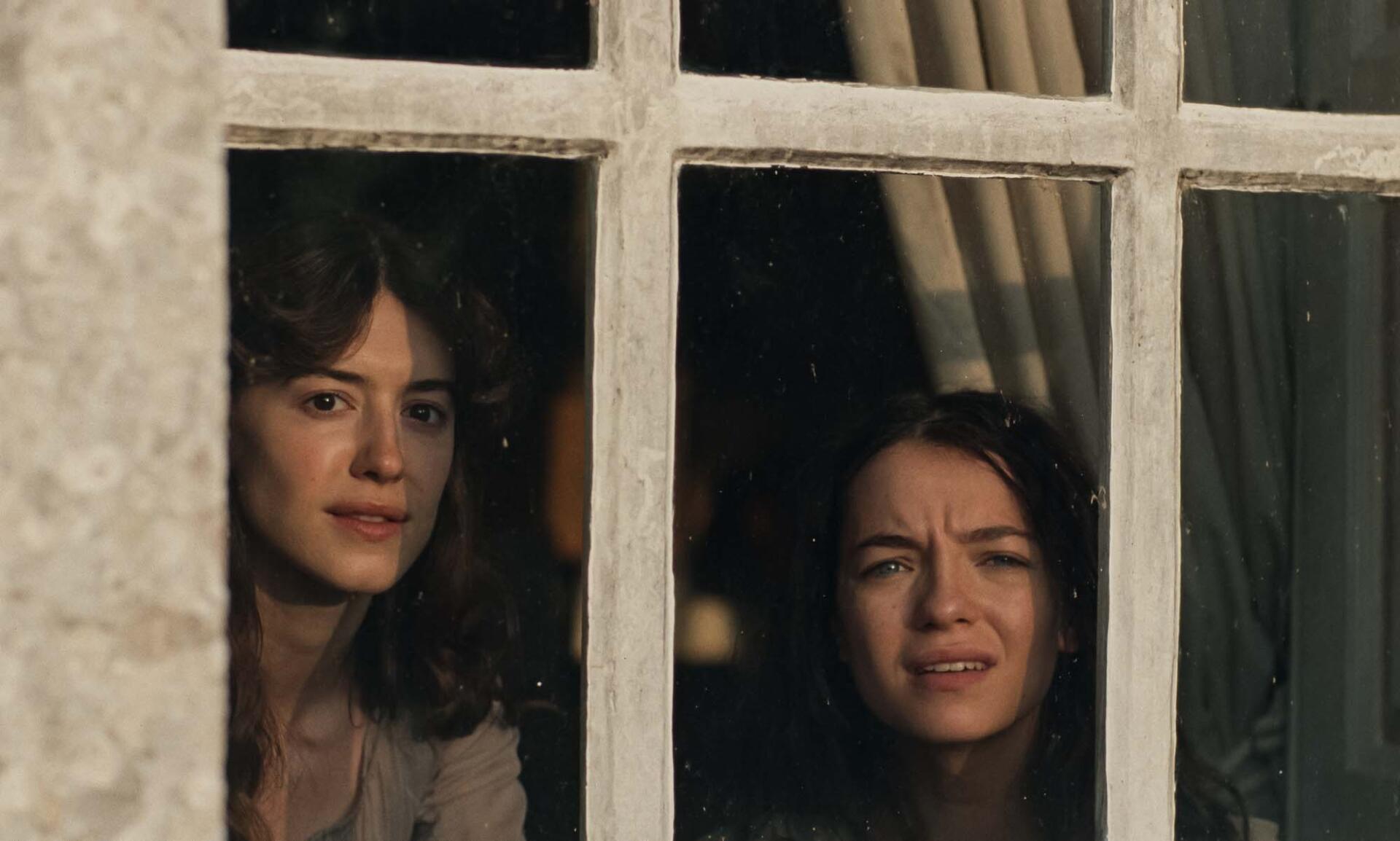 Daisy Edgar-Jones and a woman gaze through a divided window in this Sense and Sensibility HD desktop wallpaper.