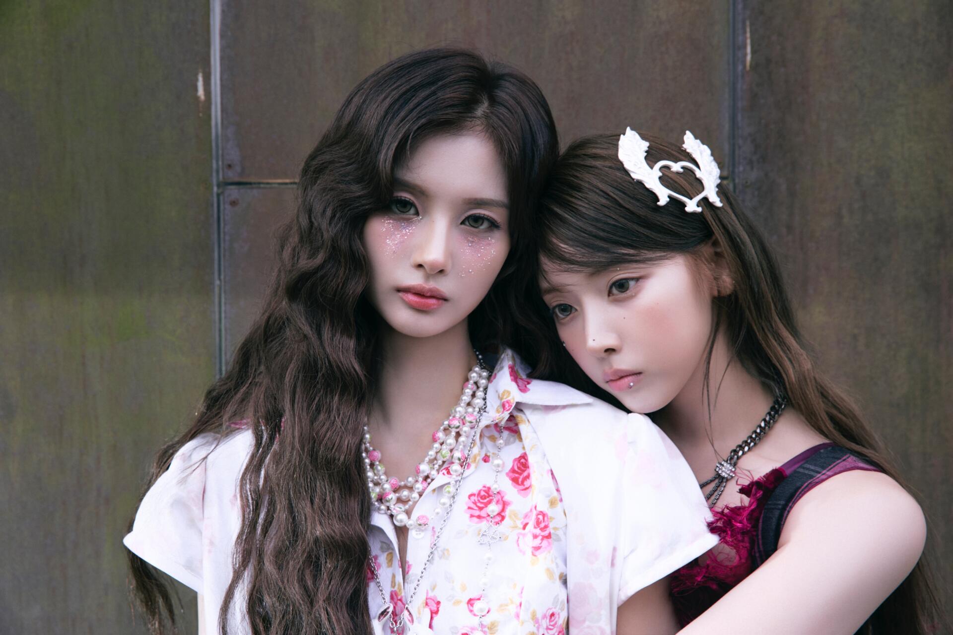 NMIXX Strange Muse fashion portrait of two women, featured in a 4K Ultra HD PC desktop wallpaper and background.