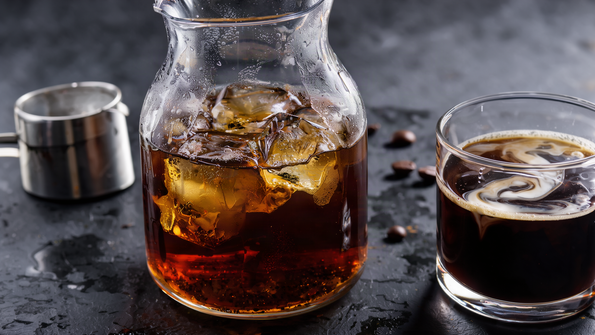 Cold brew and whisky over ice in a glass decanter and tumbler, featured in a 4K Ultra HD desktop wallpaper background.