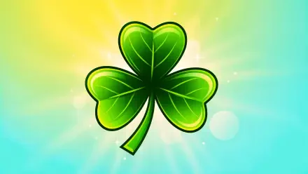 Stylized green shamrock with glowing edges against a sunlit blue-green-yellow gradient and light rays — 4K Ultra HD PC desktop wallpaper background.