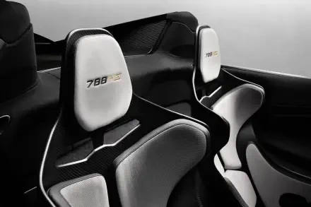 McLaren 788HS vehicle interior: carbon-fiber cockpit and white racing seats, 8K Ultra HD PC desktop wallpaper/background.
