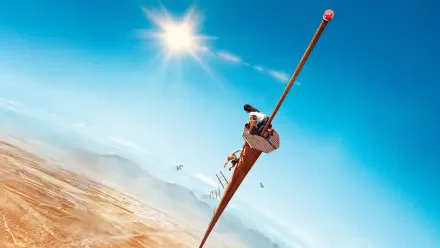 Vertigo 4K Ultra HD PC desktop wallpaper and background: lone figure balancing on a long pole high above a sunlit desert, dizzying plunging perspective beneath a bright blue sky.
