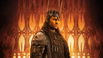Armored crowned ruler stands before glowing gothic arches and fiery light — The Lord of the Rings: The Rings of Power 4K Ultra HD PC desktop wallpaper.