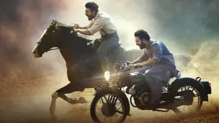 4K Ultra HD PC wallpaper — RRR action: man on a galloping horse racing alongside another on a vintage motorcycle through dusty, golden light.
