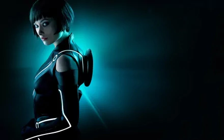 A sleek HD desktop wallpaper featuring a character from *TRON: Legacy*, showcasing a futuristic design with glowing accents against a dark, vibrant backdrop.