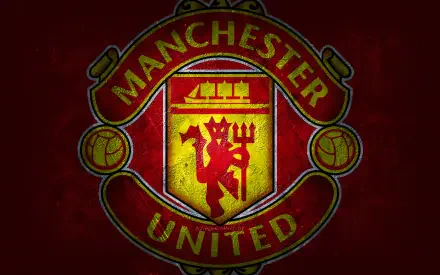Manchester United F.C. logo centered on a textured dark red background — 2K Quad HD PC desktop wallpaper and background.