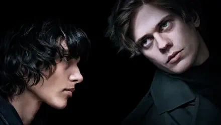 High-contrast Physint portrait of two men — one pale, intense and shadowed, the other in profile — moody 4K Ultra HD PC desktop wallpaper.