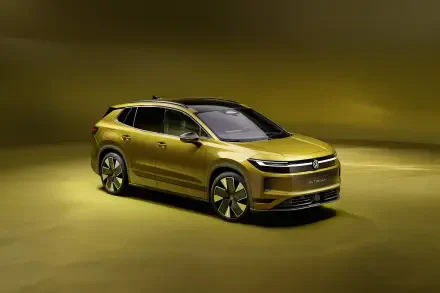 Gold Volkswagen ID. Tiguan SUV in a dramatic studio setting, 4K Ultra HD PC desktop wallpaper