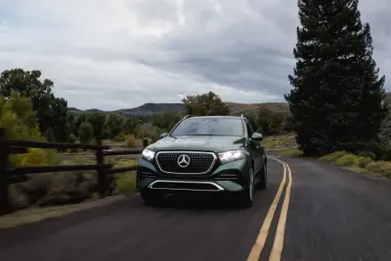 Mercedes-Benz GLS SUV driving a scenic rural road, HD PC desktop wallpaper and background.
