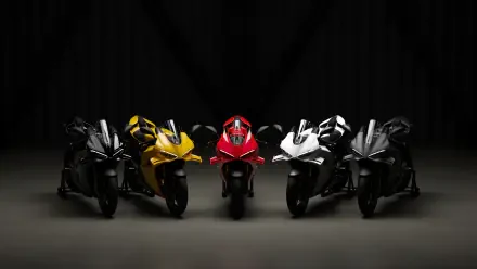 Ducati Panigale V4 sport motorcycles lined up in a dark studio, 4K Ultra HD desktop wallpaper and background.