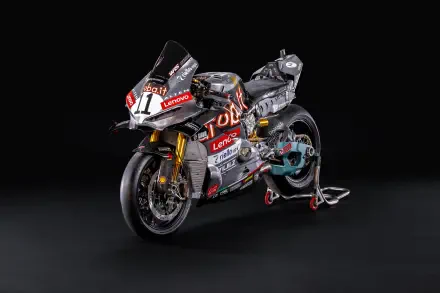 Ducati Panigale V4 R MotoGP motorcycle on a dark background, featured in an 8K Ultra HD desktop wallpaper.