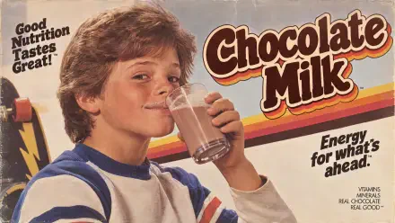 Vintage chocolate milk advertisement featuring a boy drinking milk, presented as a 4K Ultra HD PC desktop wallpaper and background.