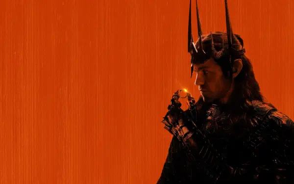 The Lord of the Rings: The Rings of Power 4K Ultra HD PC desktop wallpaper — a crowned dark figure holds a glowing ring against a textured orange background.