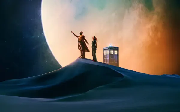 Doctor Who (2023) 4K Ultra HD PC desktop wallpaper and background: two figures stand by the TARDIS atop a sand dune beneath a massive planet, framed by a cinematic orange-blue sky.