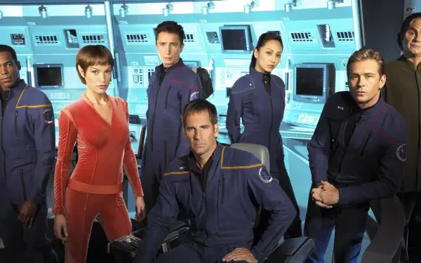 Star Trek: Enterprise crew on the ship’s bridge in uniform, dramatic lighting — 2K Quad HD PC desktop wallpaper and background.
