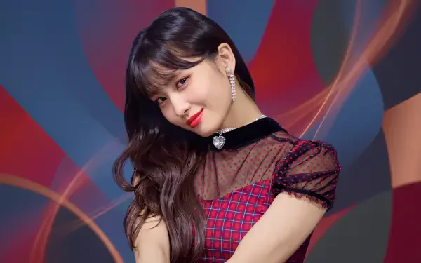 5K Ultra HD desktop wallpaper of a smiling female K-pop idol and Japanese model in red plaid with sheer black sleeves, long dark hair and a heart choker against a colorful abstract backdrop.