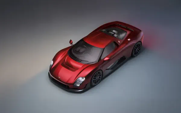 Red McLaren McL 6GT sports car in studio lighting, 8K Ultra HD PC desktop wallpaper and background.