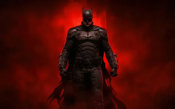4K Ultra HD PC desktop wallpaper of Batman in an armored Batsuit emerging from red smoke, dramatic low-key lighting and an imposing silhouette.
