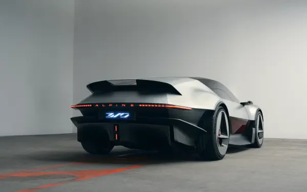 Rear three-quarter view of the Alpine A310 Vision concept sports car, featured in a 5K Ultra HD desktop wallpaper.