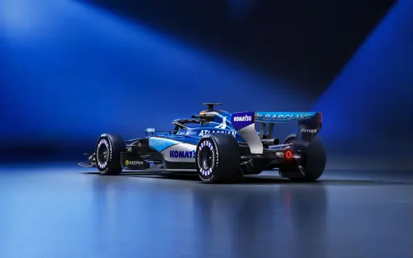 Williams FW48 F1 race car in a blue-lit studio, featured in a 5K Ultra HD PC desktop wallpaper background.