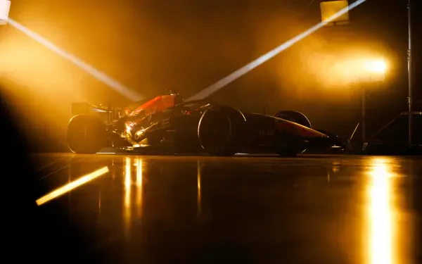 Red Bull Racing RB22 race car in dramatic golden light, 4K Ultra HD PC desktop wallpaper and background.
