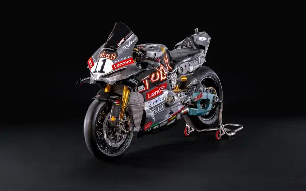 Ducati Panigale V4 R MotoGP motorcycle on a dark background, featured in an 8K Ultra HD desktop wallpaper.