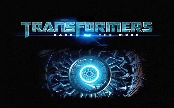 HD PC desktop wallpaper featuring the logo and glowing Cybertronian design from the movie Transformers: Dark of the Moon on a dark background.