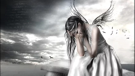 Dark emo HD PC desktop wallpaper/background: grayscale scene of a winged, long-haired woman in a white dress sitting on a ledge, face buried in her hands under a stormy sky.