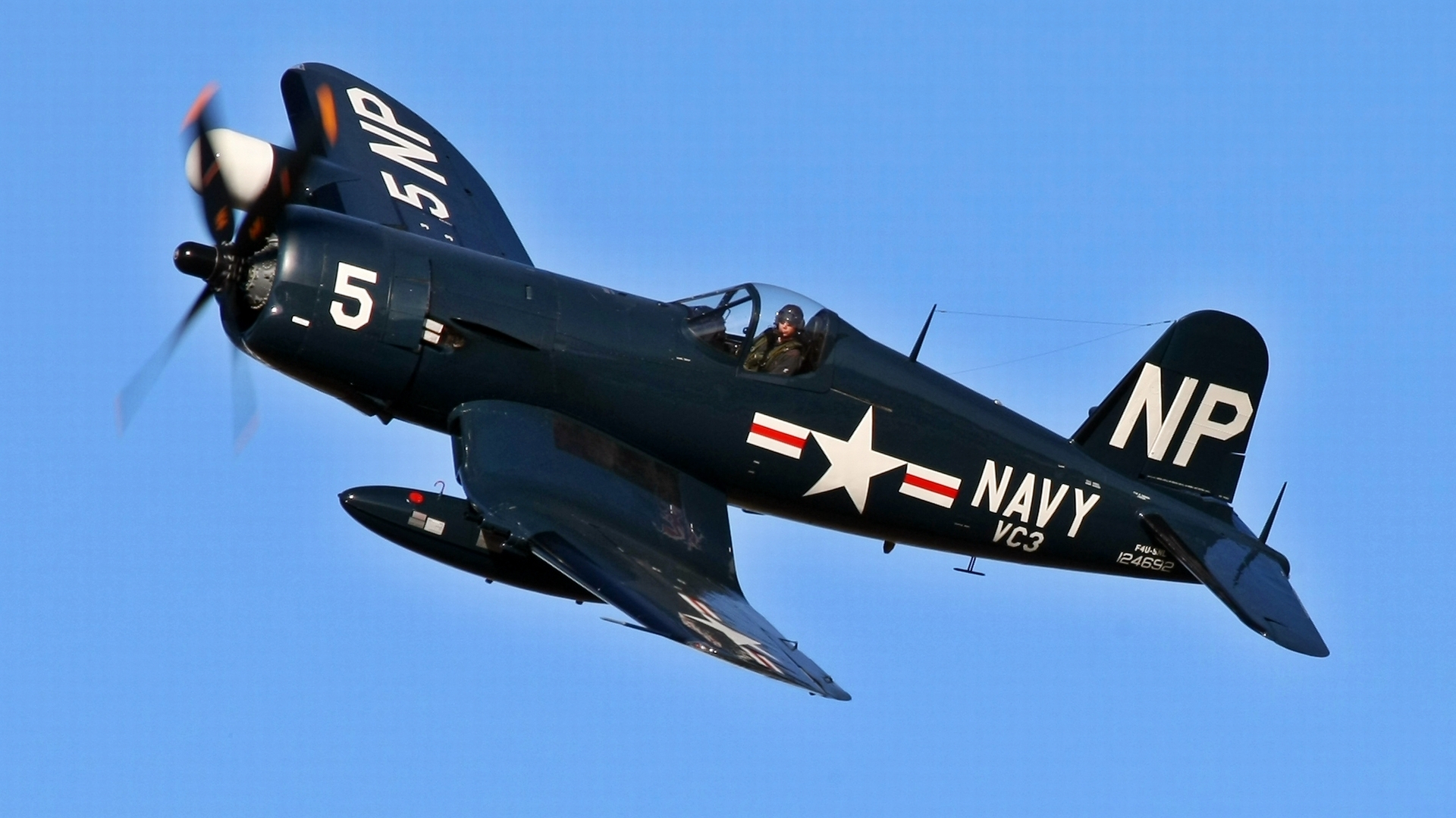 A vintage military aircraft with the iconic F4F Corsair design in a stunning desktop wallpaper.