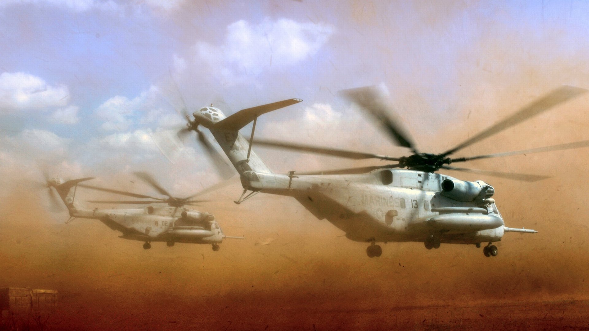HD desktop wallpaper featuring military Sikorsky CH-53E Super Stallion helicopters flying through a dusty, cloudy sky.