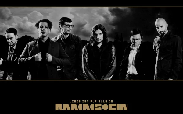 A dramatic HD wallpaper featuring the band Rammstein, showcasing the members in a striking black and white aesthetic with the text Liebe ist für alle da.