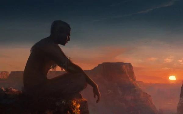 HD fantasy desktop wallpaper showing a giant figure sitting and gazing over a vast canyon landscape at sunset.