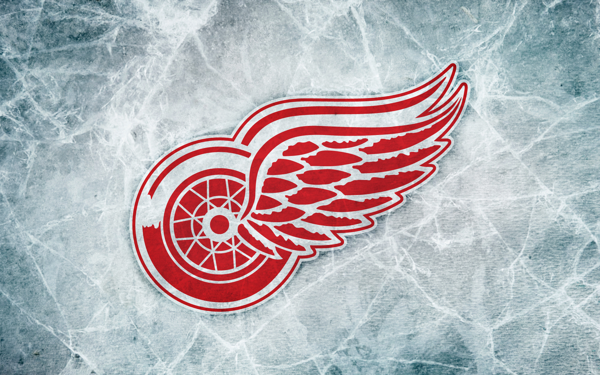 Detroit Red Wings hockey team logo on a sports-themed desktop wallpaper.