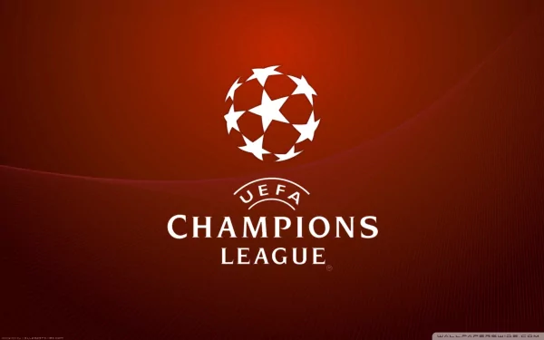 HD PC desktop wallpaper featuring the UEFA Champions League logo against a sleek red background, capturing the spirit of Europe's premier football competition.