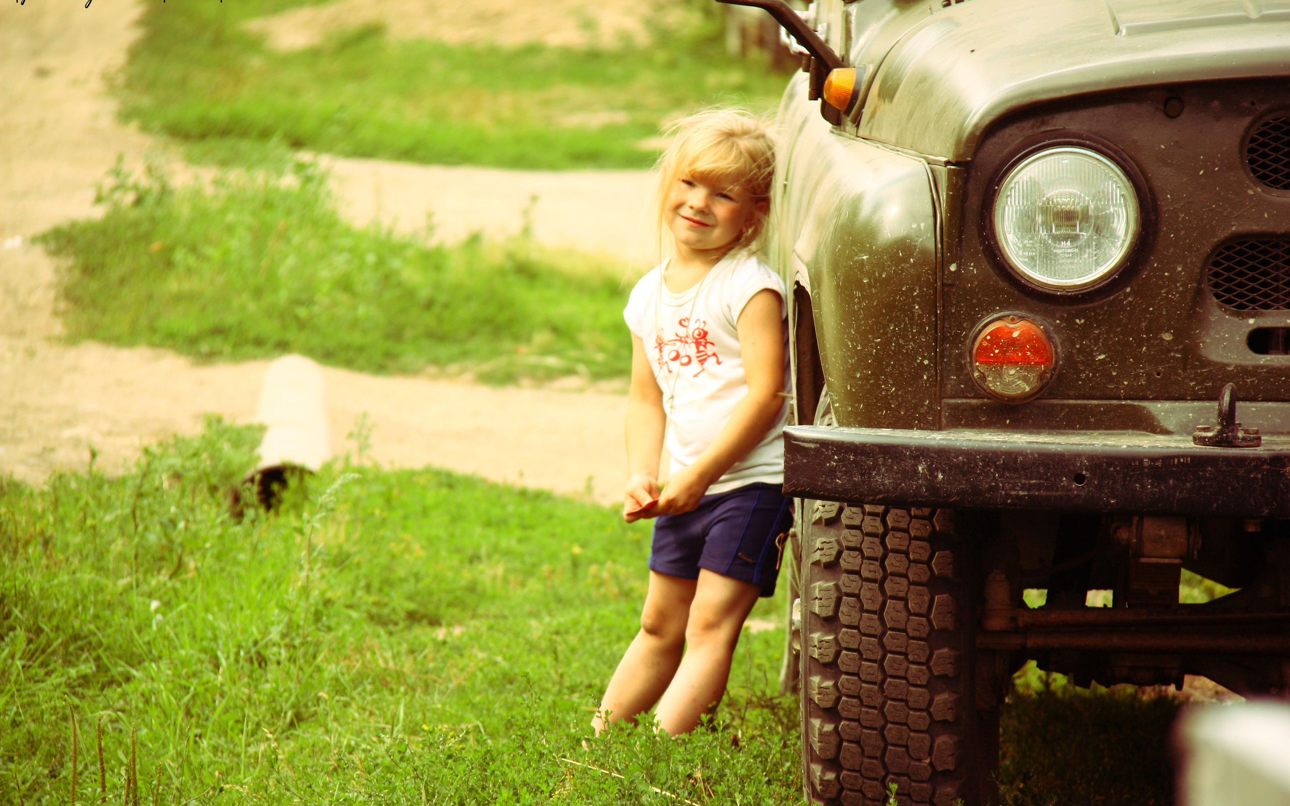 Adorable child enjoying the great outdoors in a captivating photograph.